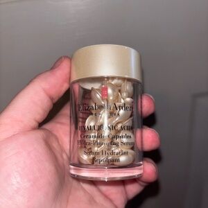 Elizabeth Arden Gold Capsule Hydra-Plumping Serum Jar